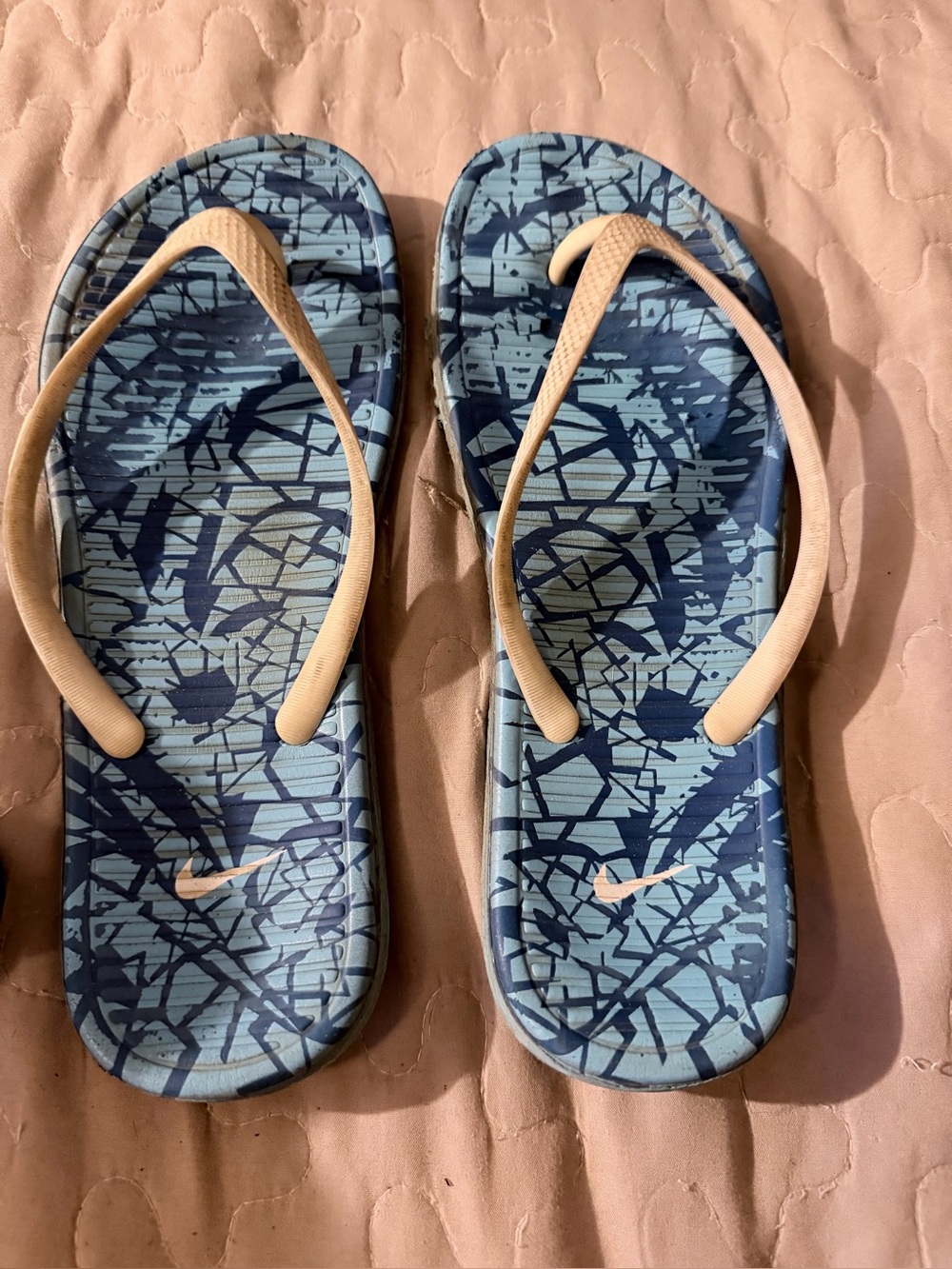 Nike Women’s Blue Patterned Flip Sandals with white straps